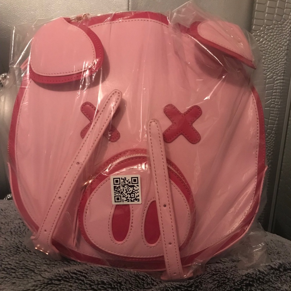 Shane Dawson pink pig backpack.